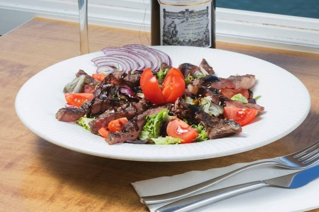 13 orange tiger on grey concrete flooring