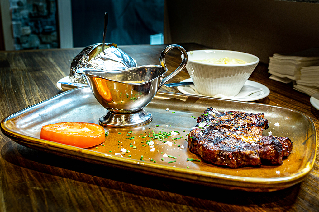 2 brown squirrel eating nuts